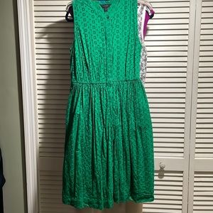 Sleeveless, lined eyelet dress in beautiful green cotton fabric
